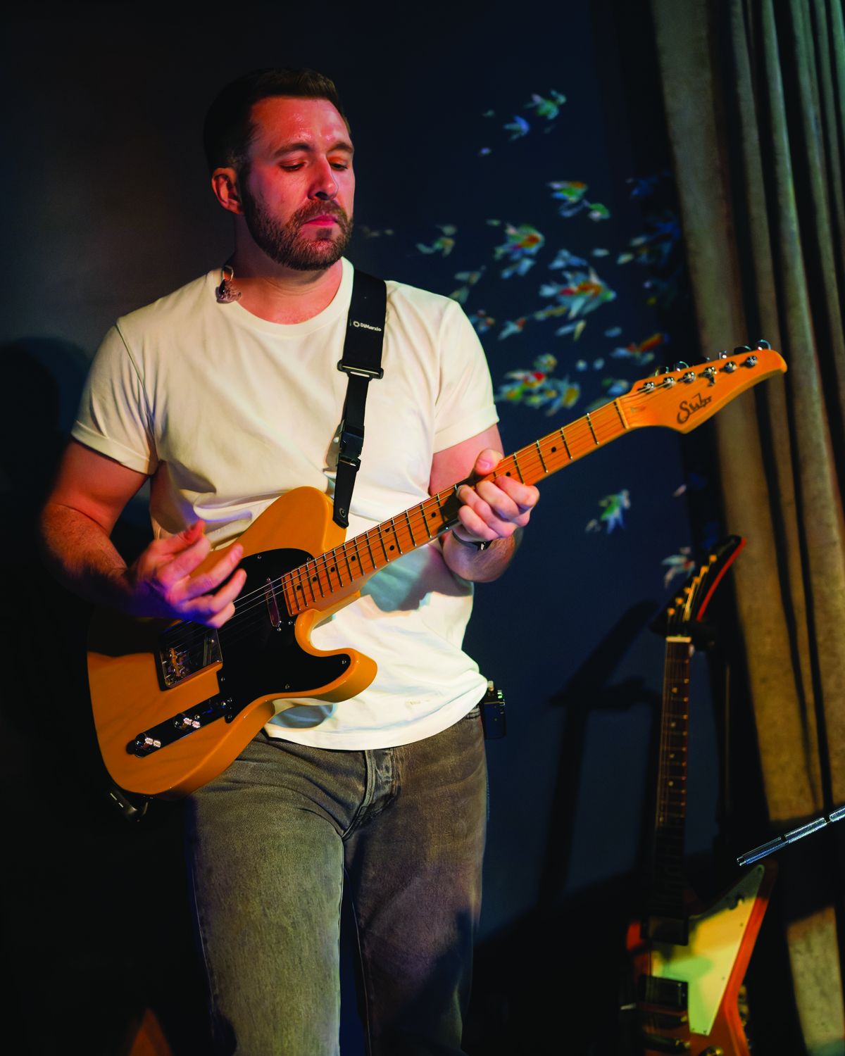 Guitarist playing a Telecaster
